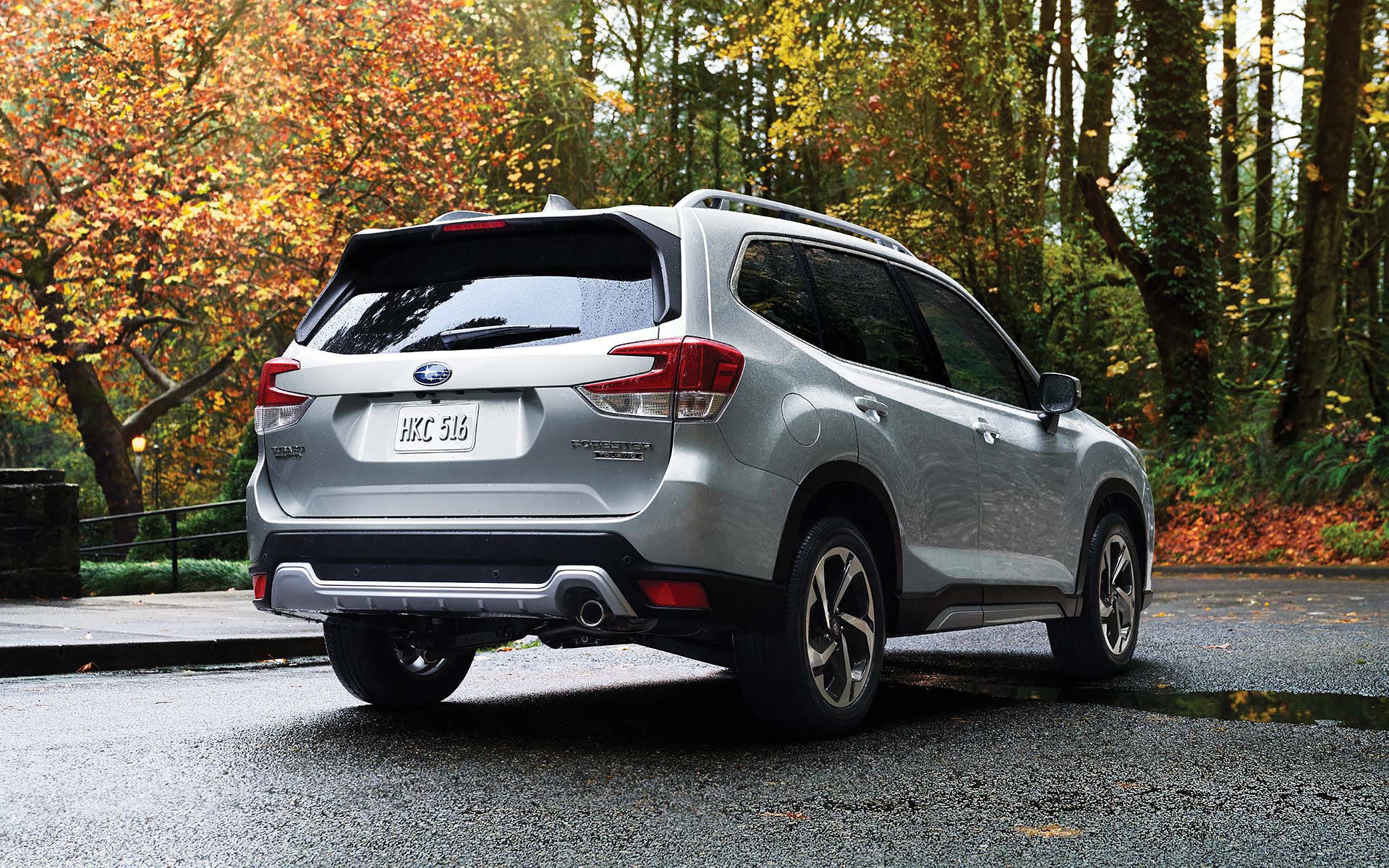 The rear of the 2022 Forester on a neighborhood street. | Bergstrom Subaru Green Bay in Green Bay WI