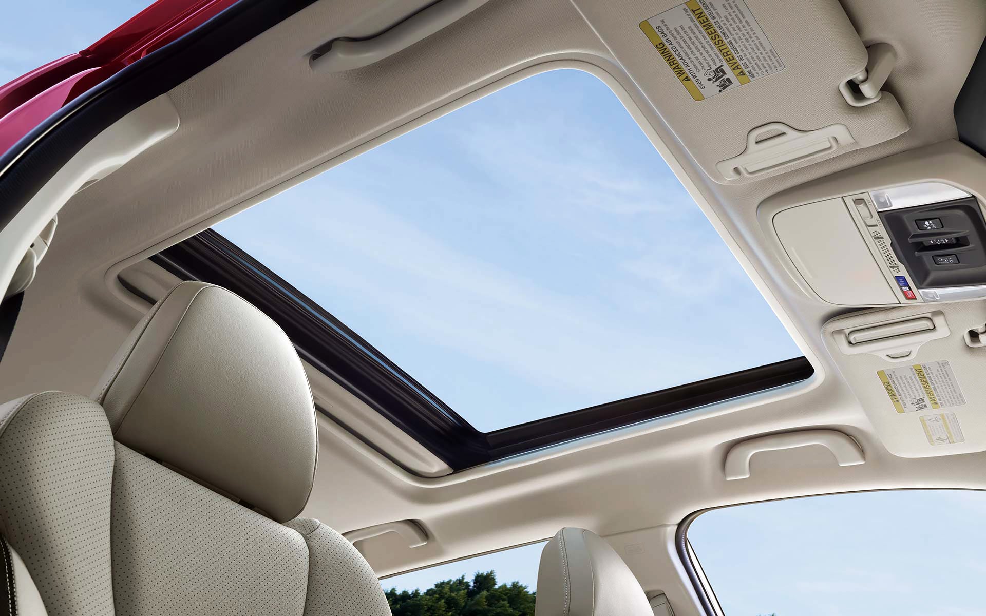 A view through the power sliding panoramic moonroof on the 2022 Forester Sport. | Bergstrom Subaru Green Bay in Green Bay WI