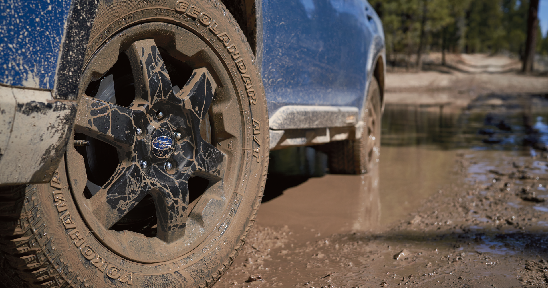 A close-up of the 17-inch off-road wheels and all-terrain Yokohama GEOLANDAR® tires on the 2023 Outback Wilderness. | Bergstrom Subaru Green Bay in Green Bay WI